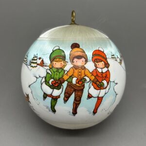Joan Walsh Anglund Christmas Ornament 1980 Satin Ball Ice Skaters Winter Scene